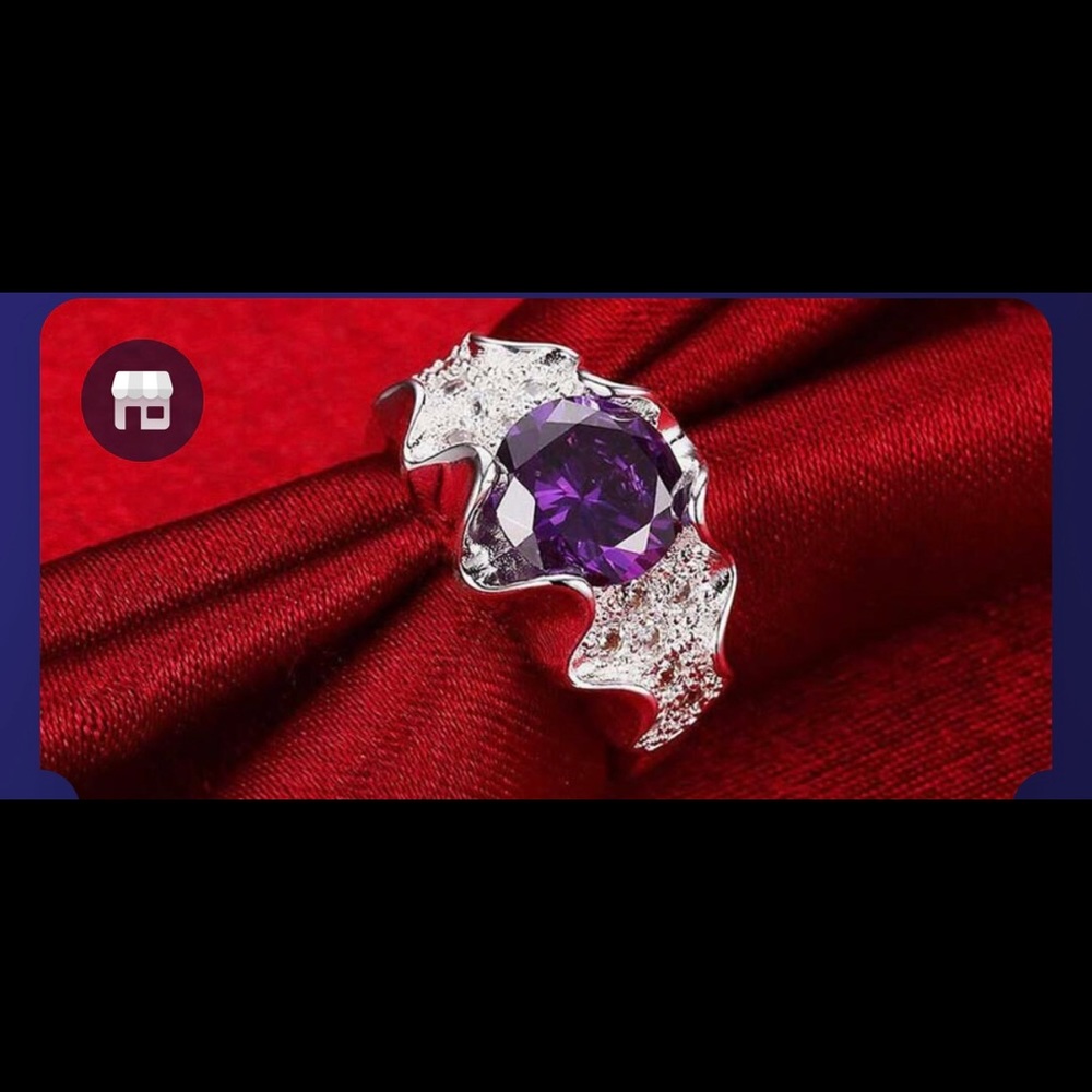 Silver Plating Purple Stone Ring
from Lumination. New, never worn